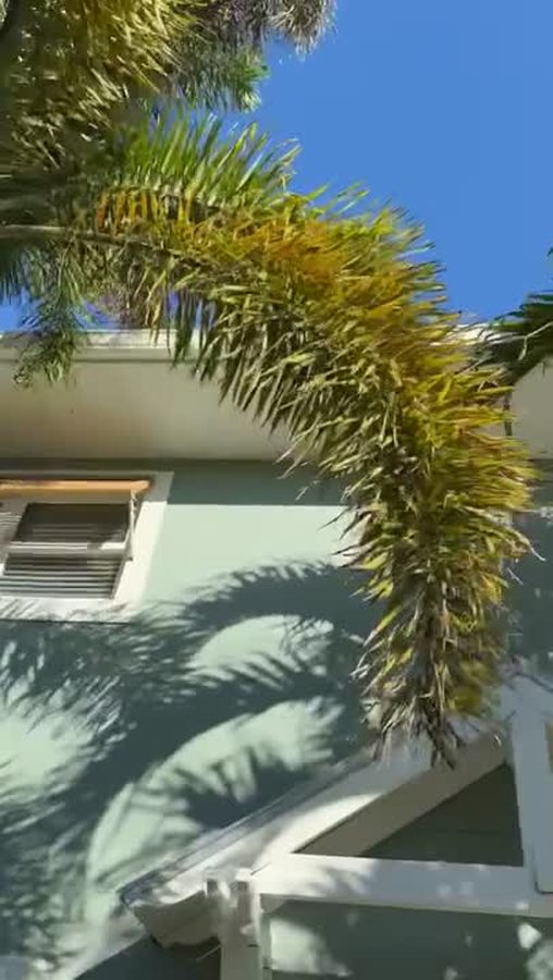 Looking up at a roofline mid-installation